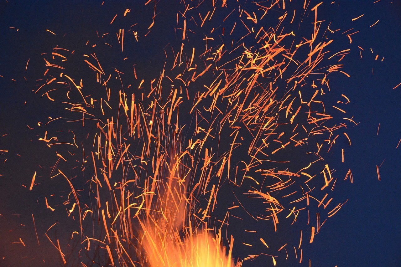 sparks from burning wood pellets