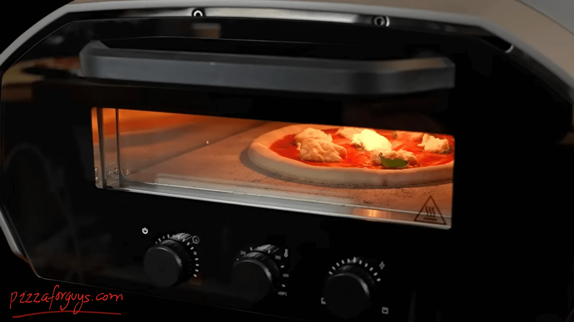 ooni volt 12 triple paned glass door to easily see the cooking progress
