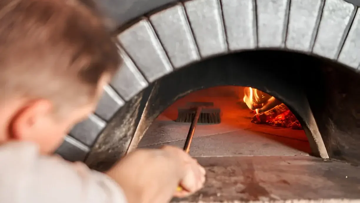 how to clean pizza oven